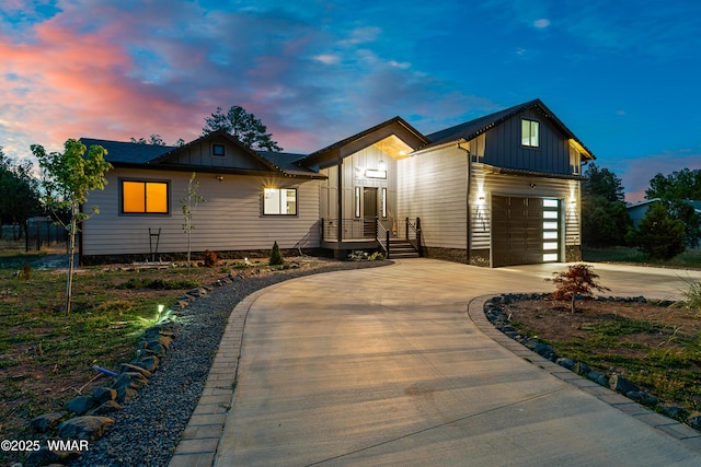 2872 Penny Ln, Lakeside, AZ 85929 - view of front facade featuring board and batten siding, driveway, and an attached garage
