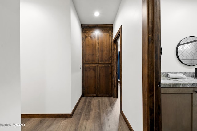 2872 Penny Ln, Lakeside, AZ 85929 - hallway featuring wood finished floors and baseboards