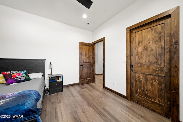 2872 Penny Ln, Lakeside, AZ 85929 - bedroom with wood finished floors, baseboards, and a ceiling fan