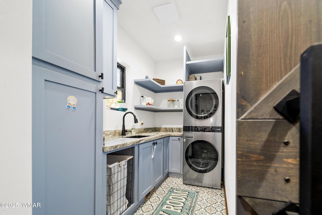 2872 Penny Ln, Lakeside, AZ 85929 - laundry area featuring estacked washer and dryer and cabinet space