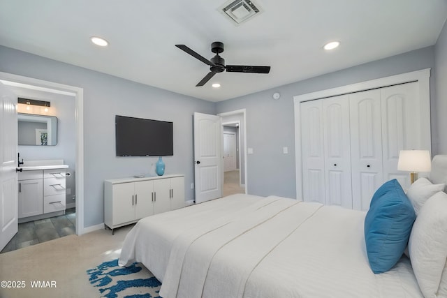 261 S 5th Pl, Show Low, AZ 85901 - bedroom with ensuite bath, recessed lighting, a closet, a ceiling fan, and light carpet
