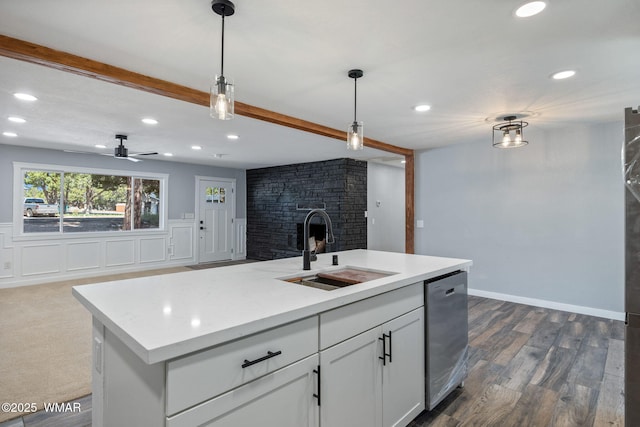 261 S 5th Pl, Show Low, AZ 85901 - kitchen featuring stainless steel dishwasher, open floor plan, decorative light fixtures, recessed lighting, and light countertops