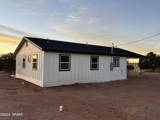 view of property exterior at dusk