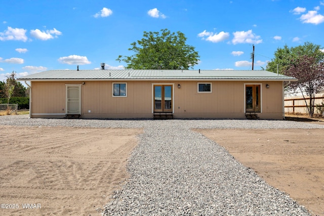 236 E 6th St, Eagar, AZ 85925 - back of house with a metal roof and french doors