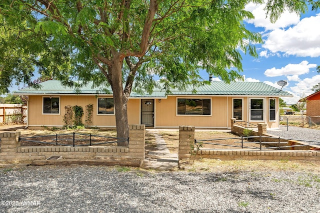 236 E 6th St, Eagar, AZ 85925 - ranch-style home featuring a metal roof