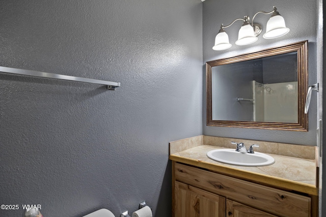 236 E 6th St, Eagar, AZ 85925 - bathroom with vanity and a textured wall