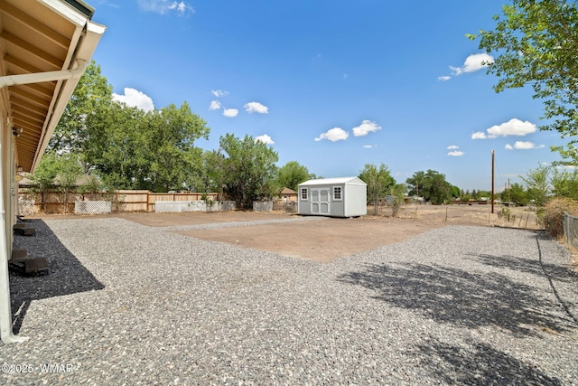 236 E 6th St, Eagar, AZ 85925 - fenced backyard featuring a storage shed