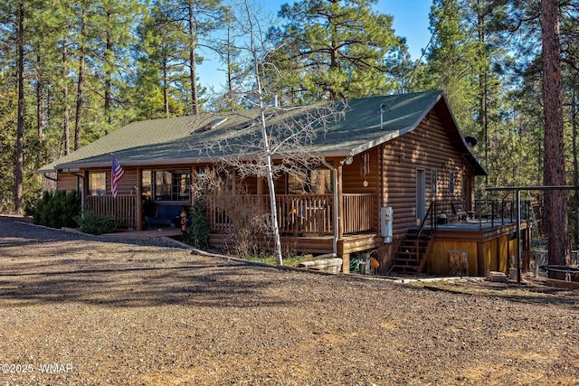 4584 Cub Lake Rd, Show Low, AZ 85901 - chalet / cabin featuring covered porch and faux log siding