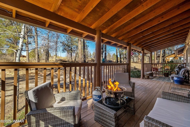 4584 Cub Lake Rd, Show Low, AZ 85901 - wooden terrace featuring an outdoor fire pit