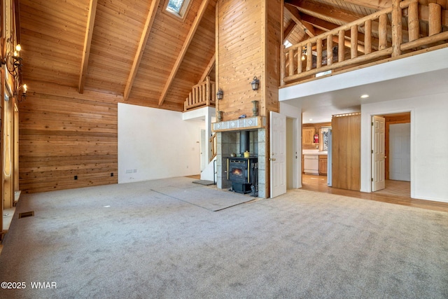 1825 E Woodchuck Ln, Pinetop, AZ 85935 - unfurnished living room featuring wood ceiling, visible vents, carpet, and beam ceiling