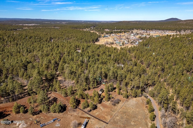 1825 E Woodchuck Ln, Pinetop, AZ 85935 - birds eye view of property featuring a wooded view and a mountain view