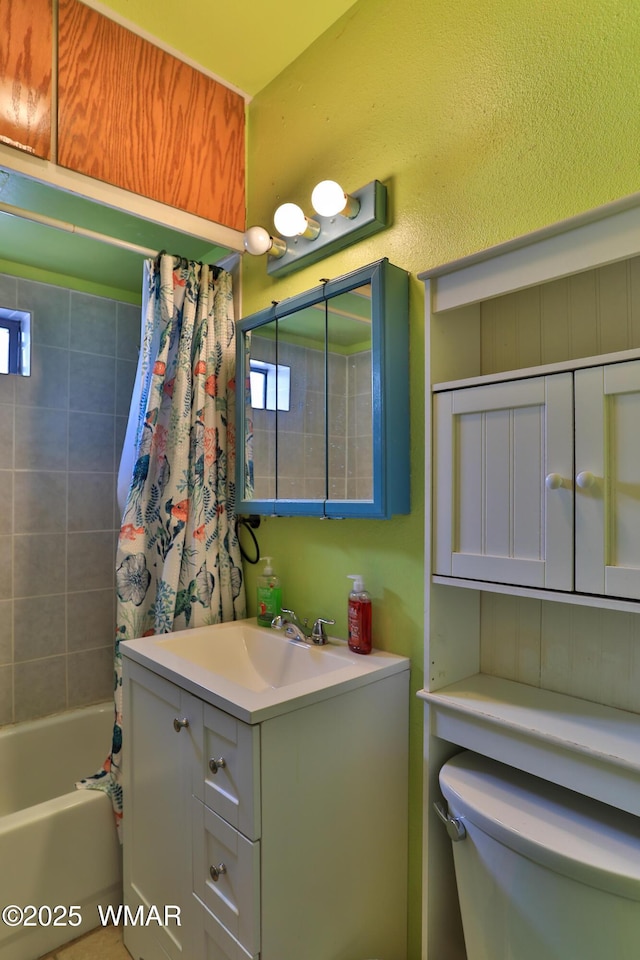 219 W Elm St, Winslow, AZ 86047 - full bath featuring vanity and shower / bathtub combination with curtain