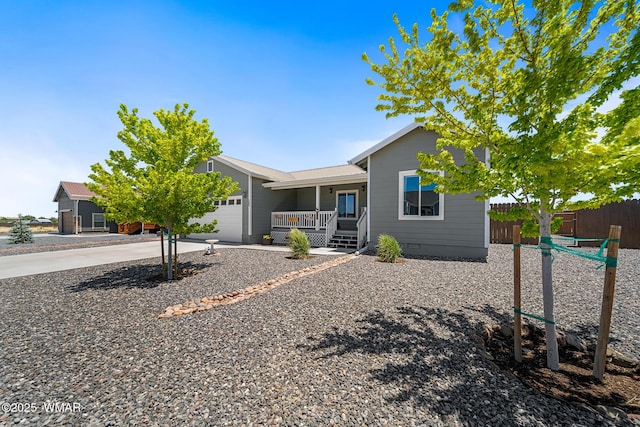289 N Divot Dr, Eagar, AZ 85925 - view of front facade with an attached garage, driveway, a porch, and crawl space