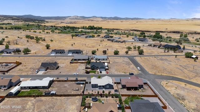 289 N Divot Dr, Eagar, AZ 85925 - aerial view of sparsely populated area with mountains and nearby suburban area