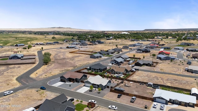 289 N Divot Dr, Eagar, AZ 85925 - aerial view of residential area featuring a mountainous background