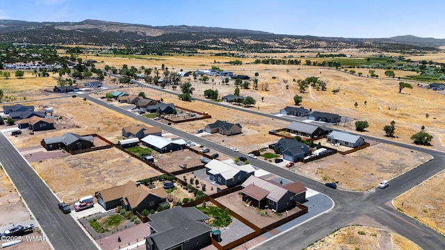 289 N Divot Dr, Eagar, AZ 85925 - aerial view of property's location featuring a mountain backdrop