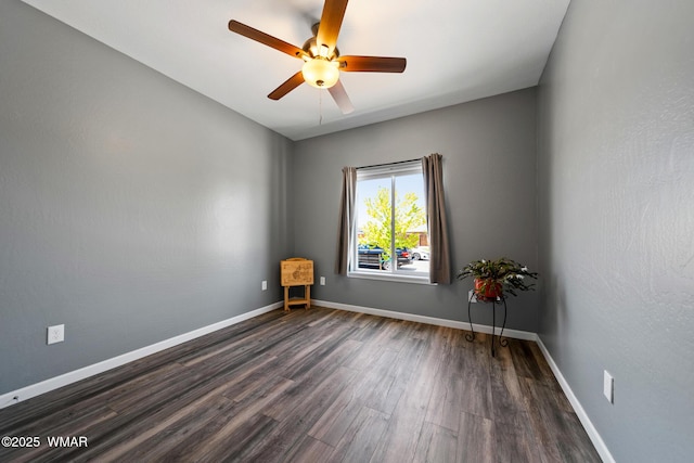 289 N Divot Dr, Eagar, AZ 85925 - unfurnished room with dark wood-style flooring and ceiling fan