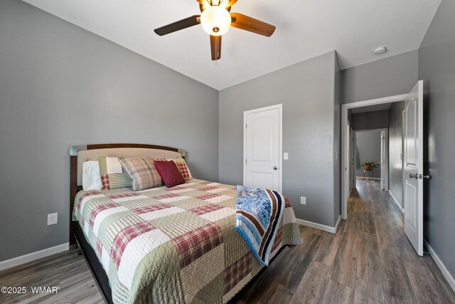 289 N Divot Dr, Eagar, AZ 85925 - bedroom with wood finished floors and ceiling fan