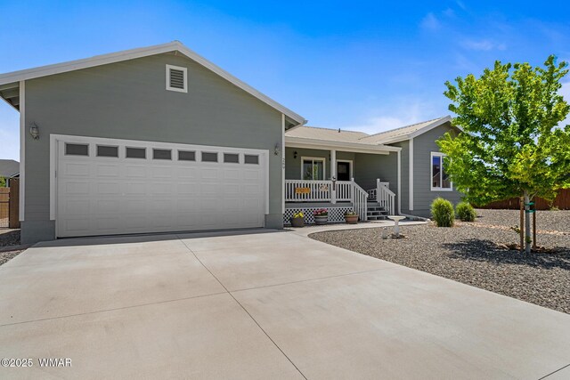 289 N Divot Dr, Eagar, AZ 85925 - single story home featuring concrete driveway and a garage
