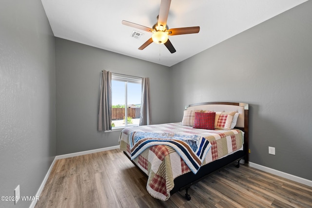 289 N Divot Dr, Eagar, AZ 85925 - bedroom with wood finished floors and ceiling fan