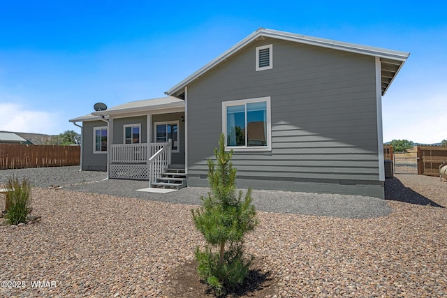 289 N Divot Dr, Eagar, AZ 85925 - back of house featuring a porch