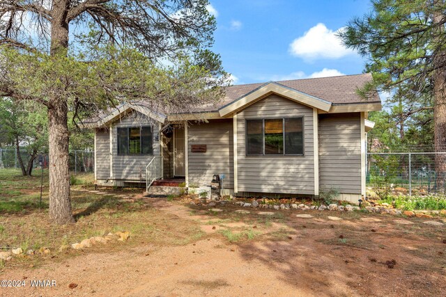 view of front of property with fence