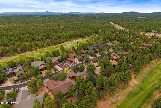 380 N Retreat Dr, Show Low, AZ 85901 - aerial perspective of suburban area featuring a forest and mountains