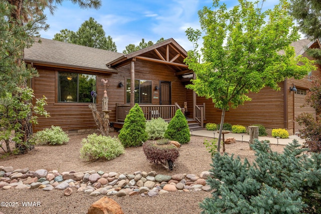 380 N Retreat Dr, Show Low, AZ 85901 - chalet / cabin featuring roof with shingles and a porch