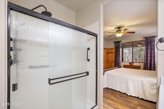 380 N Retreat Dr, Show Low, AZ 85901 - bathroom featuring a ceiling fan, wood finished floors, a stall shower, and connected bathroom