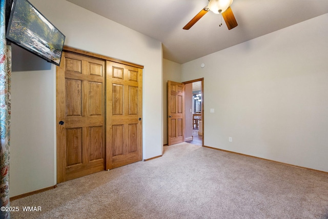 380 N Retreat Dr, Show Low, AZ 85901 - unfurnished bedroom with carpet floors, baseboards, and a ceiling fan