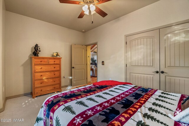 1430 E Pine Oaks Dr, Show Low, AZ 85901 - bedroom featuring light carpet, a closet, and a ceiling fan