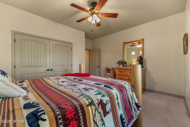 1430 E Pine Oaks Dr, Show Low, AZ 85901 - carpeted bedroom with a closet and a ceiling fan
