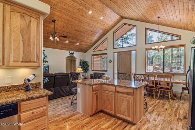 1430 E Pine Oaks Dr, Show Low, AZ 85901 - kitchen featuring stainless steel appliances, a breakfast bar, light brown cabinetry, wooden ceiling, and high vaulted ceiling