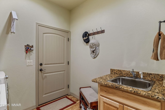1430 E Pine Oaks Dr, Show Low, AZ 85901 - laundry area featuring light wood-type flooring