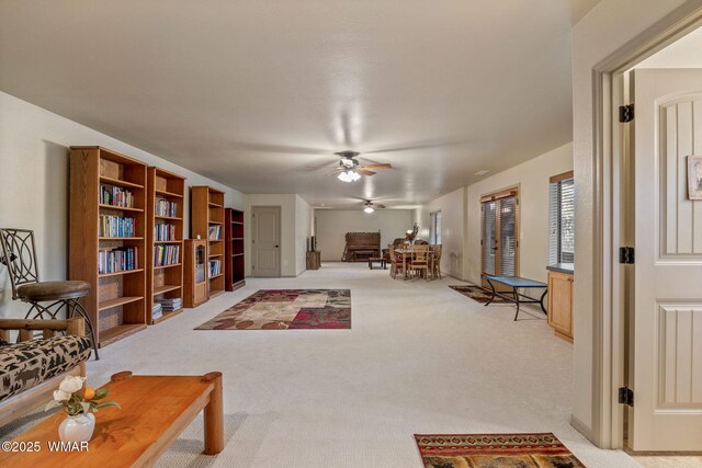 1430 E Pine Oaks Dr, Show Low, AZ 85901 - living room with ceiling fan and light carpet