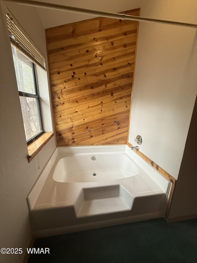 bathroom featuring a bath