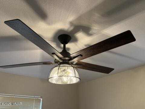 interior details with a ceiling fan