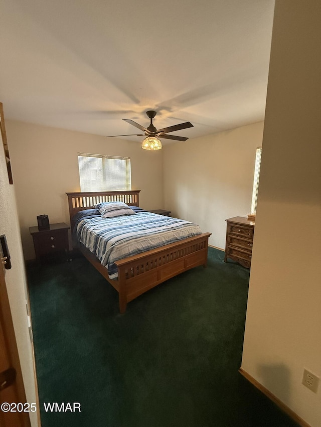 bedroom with ceiling fan and carpet flooring