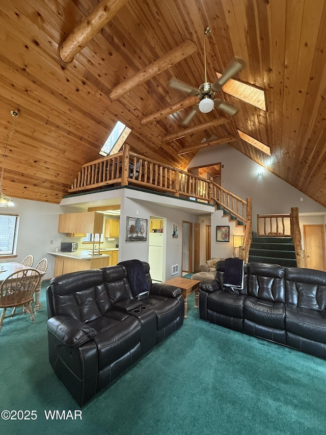 living room with high vaulted ceiling, stairway, carpet floors, and wood ceiling