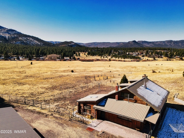 view of mountain feature with a rural view