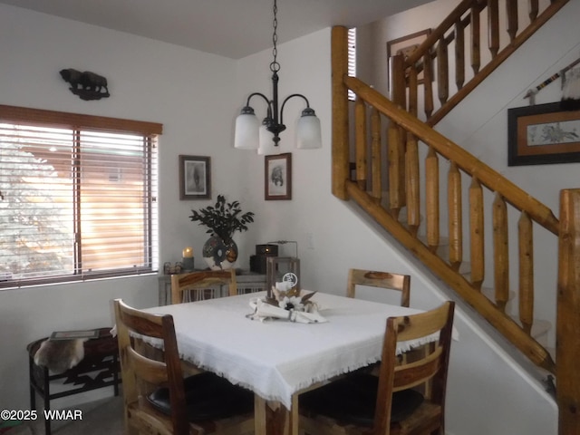 3024 Buck Crossing Way, Pinetop, AZ 85935 - dining area featuring stairs and a chandelier