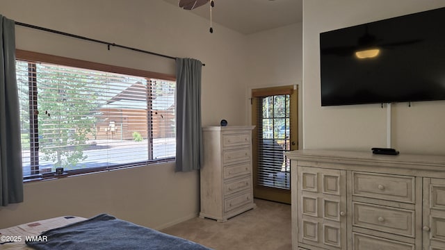 3024 Buck Crossing Way, Pinetop, AZ 85935 - bedroom featuring light carpet, multiple windows, and baseboards
