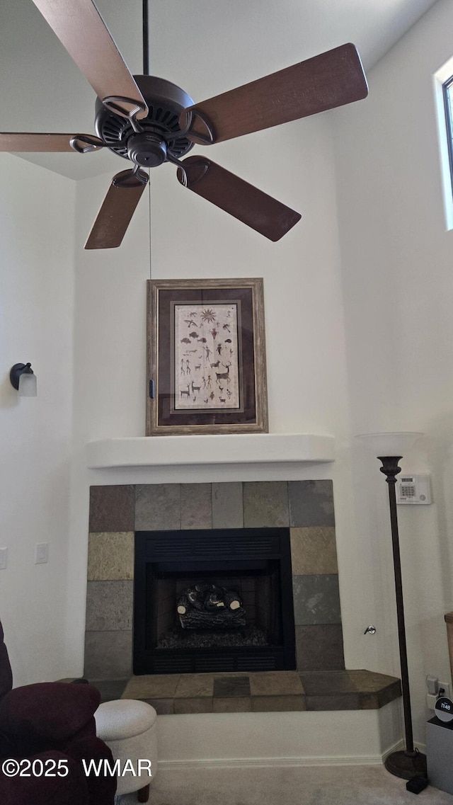3024 Buck Crossing Way, Pinetop, AZ 85935 - detailed view of a tile fireplace and a ceiling fan