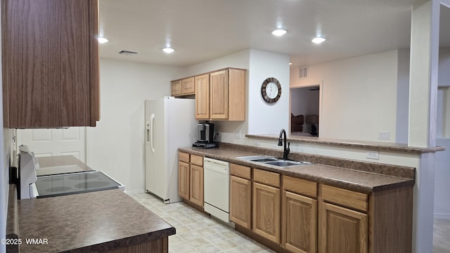 3024 Buck Crossing Way, Pinetop, AZ 85935 - kitchen featuring white appliances, a sink, dark countertops, light flooring, and recessed lighting