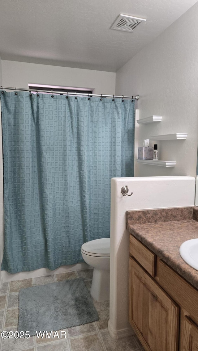 3024 Buck Crossing Way, Pinetop, AZ 85935 - full bathroom with vanity, toilet, and tile patterned flooring