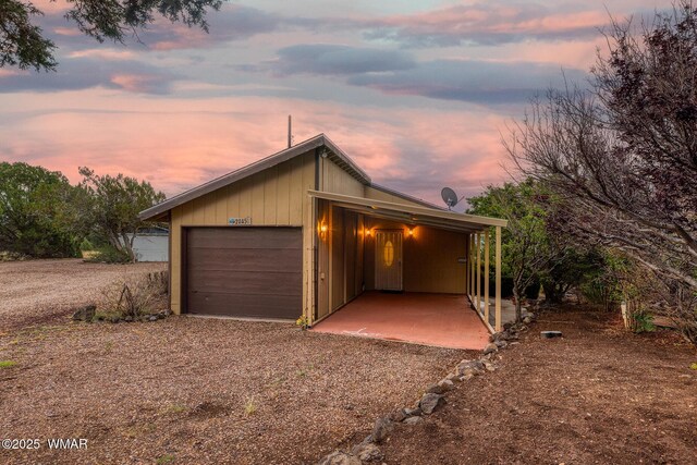 2045 Silver Creek Dr, Show Low, AZ 85901 - garage at dusk featuring driveway