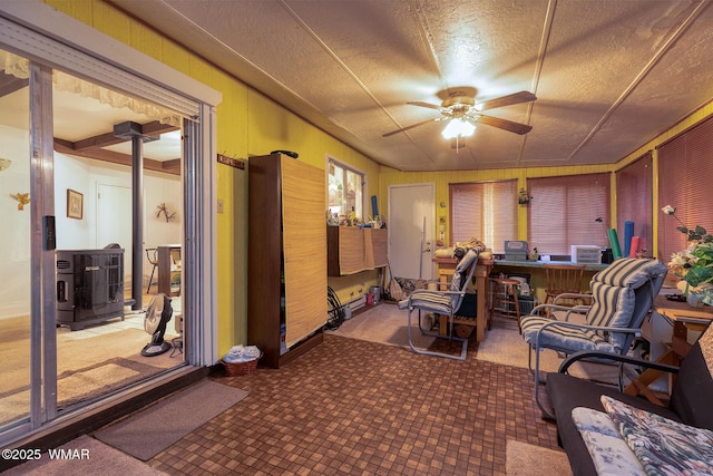 2045 Silver Creek Dr, Show Low, AZ 85901 - sunroom featuring a wood stove