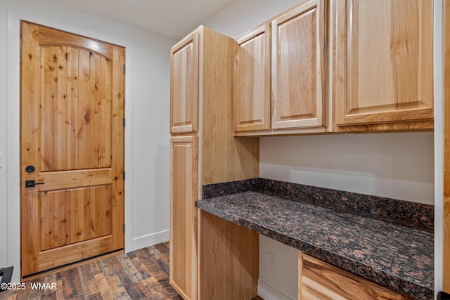 2759 Panther Cir, Overgaard, AZ 85933 - kitchen featuring light brown cabinets, dark wood-type flooring, and built in desk
