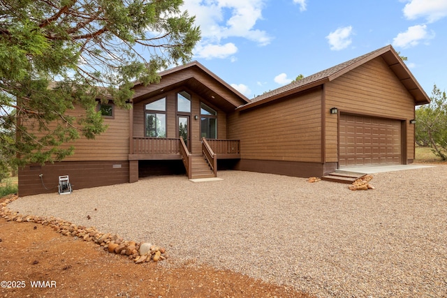 2759 Panther Cir, Overgaard, AZ 85933 - rustic home with an attached garage, a deck, stairway, and crawl space