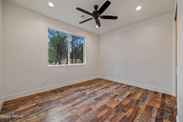 2759 Panther Cir, Overgaard, AZ 85933 - spare room with baseboards, dark wood finished floors, recessed lighting, and a ceiling fan